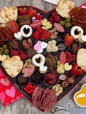 Cheese and Charcuterie Heart Box! 😍 Tap the link in my bio for the details.❣️ Use that heart box the chocolates came in and make a heart-shaped charcuterie board to snack on for Valentine's Day! 🧀🍫🍬  #charcuterie #cheeseboard #charcuterieboard #cheeseplatter #snackboard #dessertboard #ValentinesDay #chocolatebox #chocolates #valentinesdaytradition 