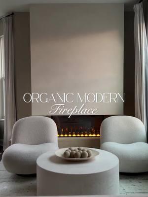 Organic Modern Fireplace This 3 sided electric fireplace is so beautiful. This fireplace can actually just be hung on your wall and you dont have to build around it. I added the black spheres to really elevate the look.  #organichome #diyfireplace #fireplacemakeover #interiores #ltkhome #amazonhome 