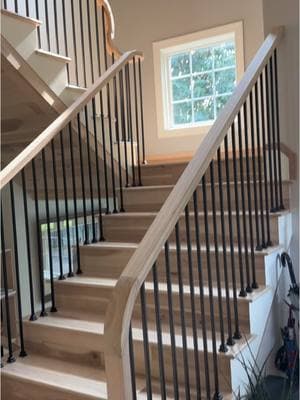 Hickory floors and ceiling detail to compliment the custom white oak railing. #carpentry #whiteoak #stair #construction #remodel #modern #custom 