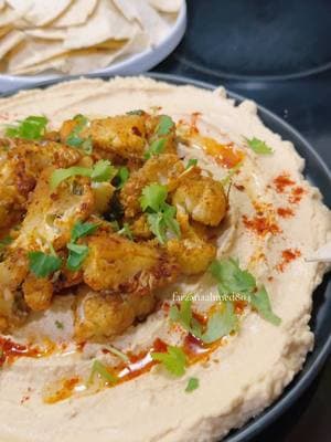 Chickpeas hummus with Roasted cauliflower 😋. Ingredients. 1 cauliflower,olive oil , salt,red chili powder,Kashmiri chili powder,chili flakes,garam masala,fresh cilantro. Oven temp 375 for 10 minutes . Humans Ingested. 2 can chickpeas drain out the liquid. 2 tablespoons tahini,1 tbs salt,1 lemon juice,olive oil,3 or 4 piece of ice.🙏 enjoy. #farzanascooking❤️ #fyp #vira #pag #fypシ #thanksforsupporting #fypシ゚viral #tiktok #unfrezzmyaccount #foryou #viral #foryou #fyp 