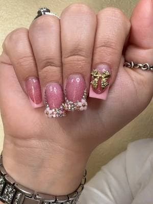 Look at how cutesieeee they are. (P.s. forever a long nail girly tho). #short #shortnails #bling #bow #pandora #applewatchultra #flower #gold #pink #fyp #parati #cutsie #stacablerings 