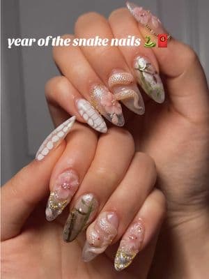 year of the snake set 🐍  happy lunar new year!! 🧧wishing you all health, happiness, and wealth!  #lunarnewyear #snakenails #lunarnewyearnails #flowernails #gelxnails #nailart #nailinspo 