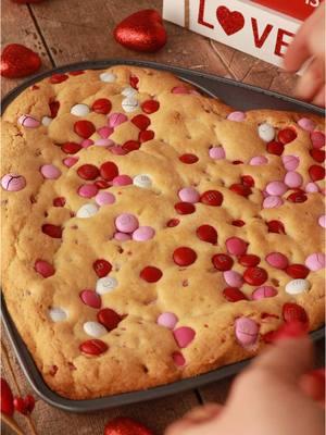 Your sweetie is sure to be happy with this strawberry cookie cake for Valentine’s Day!! 🥰💖⁠ ⁠ You'll Need:⁠ -2 packages Martha White Strawberry Muffin Mix⁠ -1 egg⁠ -1/2 cup butter, melted⁠ -1 cup Valentine’s @mmschocolate⁠ -heart shaped cookie pan⁠ -ice cream, optional⁠ ⁠ To Make:⁠ 1. Preheat oven 350° F. Spray the heart cookie pan with non stick cooking spray and set aside.⁠ ⁠ 2. Combine both Martha White Strawberry Muffin Mixes, eggs, and butter in a mixing bowl under the dough just comes together. Then add in m&m’s until combined.⁠ ⁠ 3. Place cookie dough into pan and press until evenly spread in pan. Top with more m&m’s if desired.⁠ ⁠ 4. Bake for 12-14 minutes or until light golden brown. Let cool and enjoy y’all!❤️ #budgetmom #marthawhitemuffinmix #semihomemade #easybaking 