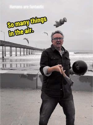 Dreamy juggling near the pier in San Diego. #dreamy #dogs #ocean #surfer #birds #circus #juggler 