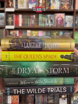 part 1 of our book haul with new releases to add to your TBR 🙂‍↕️ #alanguageofdragons #thequeensspade #thedryadstorm #wheretheheartshouldbe #thewildetrials 