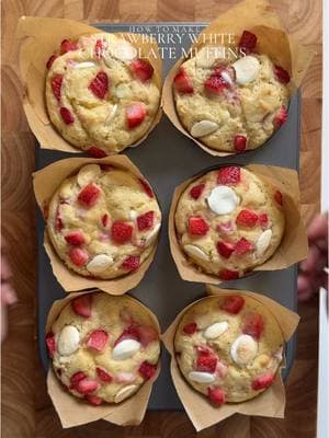 Strawberry Muffins Recipe Ingredients: For the Muffins: - 1/2 cup (115g) unsalted butter, melted - 1 cup (200g) granulated sugar - 2 teaspoons baking powder - 1/2 teaspoon baking soda - Pinch of salt - 1 tablespoon vanilla bean paste or vanilla extract - 2 1/2 cups (315g) all-purpose flour - 2 eggs, room temperature - 1 cup (120g)white chocolate chips + more for sprinkling on top - 1 cup (250ml) whole milk + 1 tablespoon vinegar, room temperature - 1/4 cup (65g) Greek yogurt or sour cream ,  room temp  - 2 tablespoons neutral oil -1 cup fresh strawberries, diced into small pieces  Method: 1. Preheat the oven to 425°F (220°C). Prepare the baking tin by lining or greasing it. 2. In a glass, combine the milk and vinegar. Let it sit for 10 minutes or until it curdles. 3. In a mixing bowl, whisk together the melted butter and sugar until well combined. 4. Add the eggs and whisk for 2-3 minutes or until pale in color. 5. Add the milk mixture, vanilla extract, Greek yogurt, and oil. Mix until well combined. 6. In a separate bowl, combine the dry ingredients: flour, baking powder, baking soda, salt, and white chocolate chips. 7. Pour the wet mixture into the dry ingredients and mix until just combined. Add strawberries and mix. Do not overmix the batter. Leave the batter for 45 minutes on room temp, do not mix again. 8. Divide the batter evenly among the lined muffin cups. Garnish with more fresh strawberries and chocolate on top if desired. 9. Bake for 5 minutes, then reduce the oven temperature to 375°F (190°C) without opening the oven door. Continue baking for an additional 13-15 minutes or until a toothpick inserted in the center comes out clean. 10. Allow the muffins to cool in the tin for 5 minutes before transferring them to a wire rack to cool completely. #muffins #muffin #strawberry #strawberrymuffins #chocolatemuffin #chocolate #Recipe #baking 