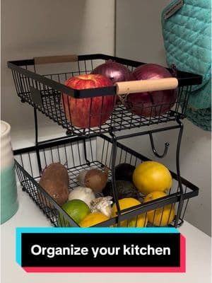 Love this tiered organizer basket. Its sturdy and a good price. #KitchenHacks #organizedkitchen #organizer #kitchenorganization #TikTokShop #kitchenstorage #storagebasket 