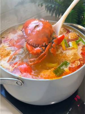 Bún Riêu | Vietnamese Crab, Pork & Tomato Noodle Soup  Extra shrimp paste & whole crab for me pleeeeaaaase!  INGREDIENTS for 6-8 servings:  - 3 liters of water  - 2 Ibs of pork neck bone - 1/2 cup of dried shrimp for stock - 2 tbsp of granulated chicken bouillon - Approx 1 tbsp of rock sugar  - 1 tsp of MSG - 1/2 Ib of ground pork   - 1 1/4 cup of crab meat  - 3/4 cup of crab meat in soya bean oil  - 2 tbsp of dried shrimp (minced) - 2 eggs - Black pepper   - 3 roma tomatoes (sliced) - 1 onion (sliced) - 1.5 tbsp of minced garlic - 1 tbsp of oil (for tomato & onion sauté) - 2 stalks of green onions  - 2 tsp of shrimp paste  - 2 tbsp of fish sauce  - 2 tbsp of oil  - 1.5 tsp of annato - Mud crab or any crab preferred  1. Parboil pork for 5mins on high heat, strain and clean off any scum from the pork. Then return to a new stock of water; set to medium heat 2. Add dried shrimp, chicken bouillon, rock sugar, msg & simmer until pork is tender  3. To a bowl add ground pork, crab meat, dried shrimp flakes, eggs, pepper & mix 4. To a pan add oil, tomatoes, onions, garlic, scallions & sauté on medium/high heat for 5mins 5. Once the pork is tender ladle in crab mix with a spoon, add sautéed vegetables, 1tbsp of crab in soya bean oil, shrimp paste & fish sauce  6. To a pan on medium heat, add oil and annatto. Cook down for 3-5 mins, strain then add to the stock  Top with fried pork belly, scallions, perilla leaves, lettuce, shrimp paste & chili peppers. Serve and enjoy with vermicelli noodles #vietnamesefood #vietnam #bunrieu