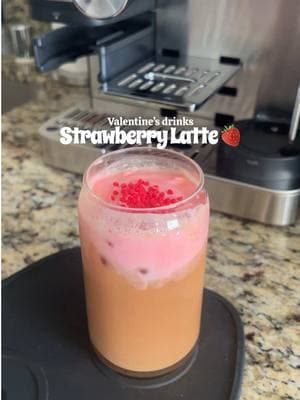 Iced vanilla latte with strawberry syrup and strawberry cold foam + sprinkles to top it off 🍓  #strawberry #strawberrylatte #valentine #ValentinesDay #valentinesdrink #valentinescoffee #valentineslatte #strawberrylatte #ninjaluxecafé 