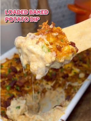 Loaded Baked Potato Dip with Crispy Hashbrowns ❤️‍🔥 If there’s one thing you make for the big game, let it be this Here’s how to make it: 8 oz cream cheese, softened 1 cup sour cream 1/2 cup mayonnaise 8 oz shredded cheddar cheese (divided) 4 oz shredded mozzarella (divided) 1 lb bacon, chopped (reserve 1/4 cup for garnish) 3–4 green onion stalks, diced ¼ cup diced jalapeños (to taste) 1 tbsp jalapeño juice 2–3 cloves garlic, grated 1 tsp onion powder (plus 1/2 tsp for hash browns) 1 tsp smoked paprika (plus 1/2 tsp for hash browns) Salt and pepper, to taste 2 cups frozen shredded hash browns Fresh chives, for garnish Crackers to dip (I love @firehookcrackers)  1. Cook bacon in a skillet until crispy, then set aside on a paper towel-lined plate. 2. Preheat the oven to 425°F. 3. Spread frozen hash browns on a baking sheet and season with salt, pepper, 1/2 tsp onion powder, and 1/2 tsp smoked paprika. 4. Bake the hash browns for about 15 minutes or until they are 75% cooked and slightly crispy. 5. In a large mixing bowl, combine softened cream cheese, sour cream, mayonnaise, 4 oz shredded cheddar, 2 oz shredded mozzarella, cooked bacon (reserve some for topping), green onions, diced jalapeños, jalapeño juice, grated garlic, salt, pepper, onion powder, and smoked paprika. Mix until well combined. 6. Transfer the mixture to a baking dish and spread evenly. 7. Sprinkle about 3/4 of the remaining cheddar cheese over the mixture. 8. Add the crispy hash browns on top, then sprinkle with the remaining cheese. 9. Bake at 350°F for about 10 minutes, then finish under the broiler until golden and bubbly. 10. Garnish with extra bacon and chopped chives before serving and enjoy! #diprecipe #appetizer #appetizers #easyappetizers #gamedayfood #gamedaysnacks #partyfood #partysnacks #superbowlsnacks #bakedpotato #loadedbakedpotato #FoodTok #cooking #EasyRecipes 