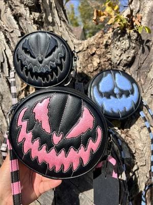 Our Oumpkin Kult Collection is getting that much bigger! We have three new color combos dropping this Sunday at 6 pm pst!  These babies are double sided, have a matching Striped strap as well as an additional Solid Black Strap and measure approximately 6.5”x7”x2.5” Which ones your favorite color?🖤🩵🩷 retails for $48 #lovepainandstitches #westaycreepy #fyp #fy #fypシ #SmallBusiness #latinoowned #familybusiness#ValentinesDay #theoriginalspookypumpkinbag #spookyvday #pumpkinbags 