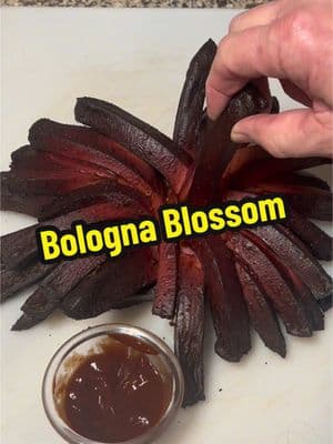 Smoked bologna blossom on the Weber kettle #bologna #smokedmeat #weberkettle #cookingvideos #BBQLovers Warning! ⚠️ Do not take my videos seriously 😎