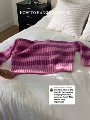 Replying to @Morgan my hack to help sweaters keep their shape! fold it in half down the center, place the hanger in the armpit, and drape the arms and torso of the sweater over the hanger! #closetorganization  #clothinghack 