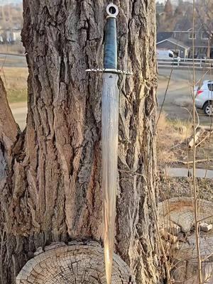 Another pattern welded shortsword is in the books and ready for leather work.  Blade is race and bearing with 15n20 powdered steel.  Guard is brass as is lower guard with a bronze ring pommel.  Grip is stabilized Maple from @Pops knife supply  #faelsforge #handcraftedblades #forgedinfirechampion #handforgedblades #shortsword #patternweldedsword #damascusword #timlouk #radcon2025 