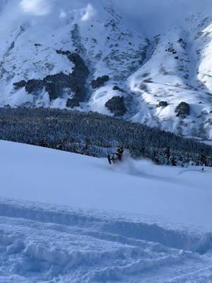 Wheelie central on the 3.25 track! She eats🔥 #snowmobilevideos #wheelie #mountains #polaris #backcountry #deepsnow 