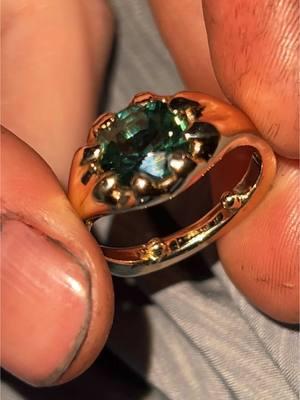 8.7 grams of 14k yellow gold with a green sapphire solitaire, size 9. it is a unique feeling to be wearing a piece of jewelry i made from start to finish. fresh out of the cast, this ring weighed 13.4 grams. finishing took a lot of weight off.. due to more loss than anticipated, i added two 14k balls for stability. if you compare this to my previous video, it is now more refined and has a cleaner look. p.s. when i x-rayed the ring, it was actually 15k-16k😶! #waxcarving #jewelrytiktok #jewelry #jewelrymaking #handmade #sapphire #engagementring 