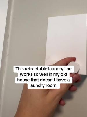 Do you need a place to hang and dry laundry, this was super easy to install and can be put away when not in use #retractablelaundryline #clothesline #hanglaundry #drylaundry #laudryday #chores #CleanTok 