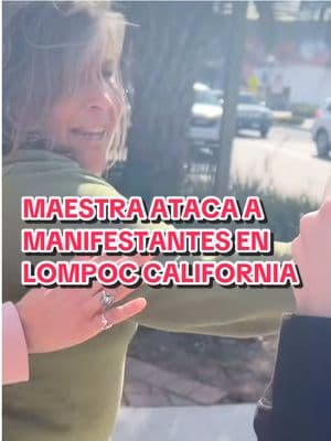 #maestra de #lompoc #california llega a instigar a #manifestantes en una #protesta #marcha #pacifica aqui vemos como #golpea a protestantes al parecer estaba bajo la influencia del alcohol #lompocunifiedschooldistrict #lompocschools 