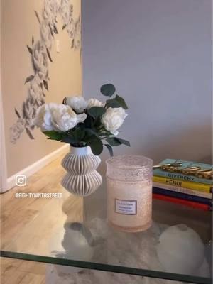 The most beautiful addition to my sanctuary 🖤 You guys know how much I love candles and am so happy to have found a CLEAN, eco friendly but still LUXE brand @lajoliemusehome 🕯️💎 The Maelyn Collection is crafted to be a captivating element of home decor, inspired by the timeless elegance of ancient botanical gardens and classical European estates. Each jar, made from high-quality glass, showcases intricate embossed floral patterns and ornamental details reminiscent of historic carvings, creating a luxurious and tactile surface. ✨ Rose Noir and Oud is a marriage of two scents celebrated for their depth, richness, and sacred symbolism since antiquity. Delicate, sweet rose evokes an imaginary garden in full bloom, while resinous oud is darkly aromatic, a fitting reflection of its unique origins - the resin is only secreted when a specific fungus seeps into the heartwood of the tree. 🌿🌹🖤 An ancient flower discovered more than 3,000 years ago. The coveted resin from rare trees in the aquilaria genus. A fresh, floral, and deeply nuanced combination. 🥀 Top Notes: Geranium, Violet Leaf Heart/Middle Notes: Fresh Rose, Violet Base Notes: Musk, Amber, Oud 🛍️https://amzn.to/3WHSsFe #fypシ #fyp #homedecor #apartment #apartmentdecor #apartmenttherapy #decor #interiordecor #candle #candlesoftiktok #modernhome #modernapartment #moderndecor 