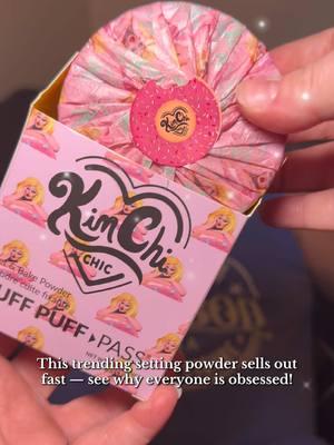 KimChi Chic Beauty Puff Puff Pass Pink Powder is finally here and back in stock—but it sells out fast, so don’t wait! This lightweight, vegan, and cruelty-free powder blurs pores, fine lines, and texture with skin-loving ingredients like vitamin E and rich starch. The pink shade brightens and color-corrects dark circles while seamlessly blending under the eyes and into your blush. Get yours before it’s gone! #pinkpowder #pinkundereyetrend #pinkpowderundereye #pinkundereyepowder #pinksettingpowder #kimchichicbeauty #kimchichic #kimchichicpowder #puffpuffpass #puffpuffpasspowder #affordablemakeup #beautydeals #loosepowderrecommendation #settingpowderrecommendation #makeuprecomendation #undereyecircles