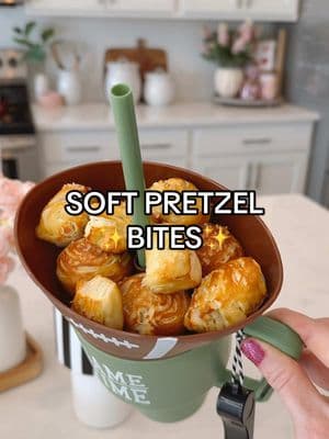 Super Bowl snack comin’ at ya (and the football snack sippers just came from the Target Dollar Spot)! 🥨🏈 ✨Soft Pretzel Bites✨ - 1 can refrigerated biscuit dough (8 ct.) - ¼ cup baking soda - 1 egg (plus 1 Tbsp water) for egg wash - coarse salt Separate biscuits and roll each one into a small rope shape. Cut into 4-6 equal pieces. Fill a pot about halfway with water and bring to a boil. Once boiling, slowly stir in baking soda. Drop your dough balls into water and boil for 10 seconds (no longer or it will get too mushy). Use a slotted spoon to get them out and lay on baking sheet. Brush with egg wash and sprinkle on salt. Bake on 425°F for 15 minutes.  #SuperBowl #superbowlsnacks #superbowlfood #softpretzel #softpretzelbites #easysnackidea #hostingideas 