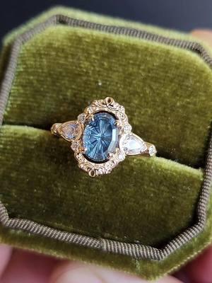 Oval Montana Sapphire expertly cut by @brettkosnar and set in our Odette setting.  #fantasycut #fantasycutgems #engagement #engaged #uniquejewelry #fantasyjewelry #fairytalejewelry #sapphirering #engagementringideas #montanasapphire #sapphire #ovalengagementrings 