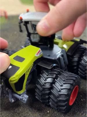 ✨Spin-tactular Tractor✨   Claas 1:64 Scale 4500 Xerion Tracto   This Prestige Collection item features front and rear dual tires, all wheel crab style steering, tie rod steering, and a rear 3-point hitch that raises and lowers. In addition, the entire cab assembly spins fully around the tractor chassis and gives you a great look from any angle.   Sku: 16509 Age Grade: 14+ Available NOW at ERTL.com! . . . #claas #ertl #ertlfarm #farm #farmer #farmtoy #farmtoys #toy #toys #farmlife #tractor #tractorlife #tractorlover #tractorlove #claastractor #agriculture #aglife #agri #diecast #collector #collectible #diecastcollectible #diecastcollector #collection #diecastcollection #diecastphotography #farmhouse #collectibles #combine #farmdisplay