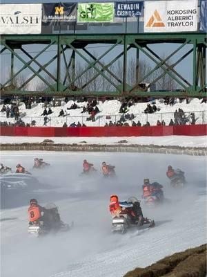 24 sleds come into turn 1 at Soo I-500 after speeds of 100 MPH on the straightaway. This race is all about endurance and rider skill and features 500 laps on a 1 mile ice oval. #SooI500 #snowmobile #snowmobileracing #saultstemarie 