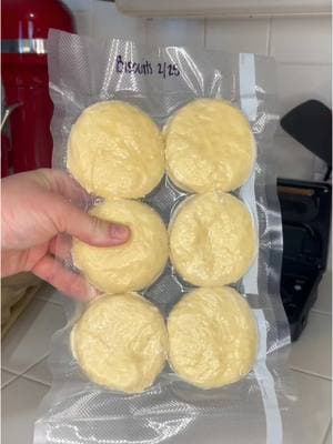 Freezer biscuits. In a mixing bowl, add 2 cups all purpose flour, 1 tbsp sugar, 1 tbsp baking powder, and 1 tsp salt. Mix, then add 1/3 cup grated butter. Once mixed and the dough starts to form little pebbles, add 1 cup milk. Mix until the dough starts to pull away from the sides of the bowl. On a lightly floured surface, roll out your dough. Depending on how thick you want your biscuits, will determine how thick you need to roll. Cut biscuits and immediately freeze on a baking sheet. Once frozen, place biscuits in a bag. To use, bake from frozen at 425 for 16-18 minutes or until golden. #nospend #budget #budgeting #baking #cooking #madefromscratch #homemade #homemadefood #ingredientsonly #homemaker #homestead #simpleliving #foodpreservation #vacuumseal #freezer #deepfreezer #kitchenrestock #preservingfood #freezerstash #mealplanning #mealprepping #homemadekitchenrestock #hacks #KitchenHacks #kitchenstaples #homemadecooking #freezingfood #freezermeals #savingmoney 