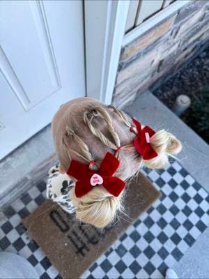 This one is so fun! Inspo from @inthelifeoftayt 😍 @Evie Pearl Handmade LLC bows 🤩 #cutehair #valentinehair #hearthair #messybuns #slickback #girlygirl #lovestyleshair 