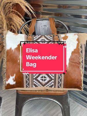 Weekend plans just got an upgrade! ✨ The Myra Bag Elisa Weekender is your new go-to for road trips, rodeos, and wherever the adventure takes you. With its perfect mix of rustic charm and roomy storage, this bag is as stylish as it is practical. 🌵🤠 Whether you're packing up for a quick getaway or need a chic carry-all for daily errands, this beauty has you covered. Plus, that distressed leather + canvas combo? Absolutely dreamy! 😍 Ready to travel in style? Grab yours now before they’re gone again! #WeekendReady #MyraBag #CowgirlStyle #TravelInStyle #WesternFashion #RodeoRoadTrip #PackingEssentials #BroncoWesternSupply  You sent #TikTokShopLoveAtFirstFind #WesternFashion #CowgirlStyle #OOTD #WesternOutfits #RanchWear #CowgirlInspo #BootsAndJeans #WesternChic #RodeoReady #StyleWithGrit #WildWestVibes #EverydayCowgirl #WesternTrend #RusticGlam #CowgirlEnergy 