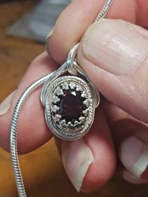 This one was supposed to have originally been a ring but ended up a beautiful little tourmaline and 925 sterling silver pendant with a 18" sterling silver snake chain #jewelrydesignsbyshelly #sterling #hippygrandma #foryourpage #fyp #jewelrytiktok #stonergirl #handmadejewelry #wirejewelry #wireartist #sterlingsilver #sterlingsilverjewelry #silversmithingjewelry 