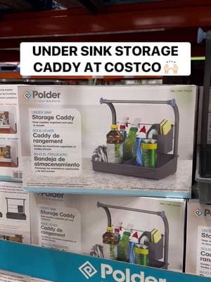 🙌🏻 Under Sink Storage Caddy at Costco! How USEFUL is this?! It features easy-lift knobs, an adjustable bin, a tray divider, and hanging rods…your cleaning supplies organization will never be neater! Just $14.99 #costco #costcofinds #undersinkorganization #organization 