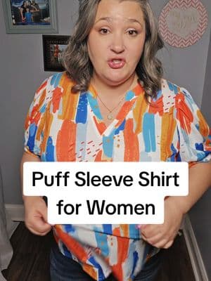 This vibrant puff sleeve shirt is perfect for pairing with dress pants for a business casual look! #styleinspo #OOTD #womensstyle #midsizefashion #womensshirt #dressshirt #businesscasualoutfits 