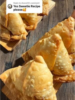 Replying to @shana34 Here's the recipe for Aloo Samosa Dough: 1/2 cup ghee 1/2 cup water plus 1/4 cup for kneading to use a spoon at time to make sure to not over wet the dough  1 teaspoon salt  1/2 teaspoon ajwain  4 cups flour  Filling: 2.5 lbs potatoes, peeled and boiled  1 large onion, chopped  1 teaspoon ghee 1 tablespoon coriander seeds  I tablespoon cumin seeds  1 tablespoon crushed chili pepper, use less for mild  1 teaspoon red chili powder, use less for mild  1 tablespoon amchoor  1/2 teaspoon turmeric powder  1-1..5 teaspoon salt or to taste  3-4 green chilies , chopped  1 cup cilantro, chopped  Instructions for dough: Mix in the salt and ajwain into the flour and add warmed up ghee.  Mix well by rubbing between the palms of your hands until the mixture resembles wet sand.  Add in half cup of water and mix, only use more water a spoonful at a time just until the dough comes together.  Cover with plastic wrap and rest for 30 minutes and make the filling in the meantime.  For the filling: Crush the cumin and coriander seeds into a rough powder.  Add a teaspoon of ghee in hot pan. Add the chopped onions and sauté just until translucent. Now add the crushed cumin and coriander seeds along with the rest of the spices listed above. Cook for about 30 seconds and then turn the flame off.  Add the boiled potatoes along with green chilies and cilantro . Mash half of the potatoes using a potato masher, then switched to a wooden spoon.  Mix everything until welcome combined taste and adjust salt if needed.  Set aside to completely cool. Now let's work on the dough again, this time using moistened hands just to knead the dough for 5 to 6 minutes until it comes together and becomes kind of smooth. Cover with plastic wrap and set it aside to rest for another 30 seconds. Once the dough has rested for another 30 minutes, divide it into 10 equal balls. They should come to around 75-76g each.  Make tight dough balls and rest them covered with plastic wrap for 15 minutes. After 15 minutes using some flour roll the dough balls into oblong roti.  Set them all on top of each other and then fold the top one and half make an indentation and cut them with a sharp knife.  Fill all the pastry halves with the cool potato mixture following the directions in the video. Fry the Samosa at in oil heated to 350°F for 5 to 8 minutes. Remove from the oil and drain them on a cooling rack. Cool them for at least one to two hours so they are completely cool to prevent steaming. You can store them in a Ziploc bag or a plastic container for in the freezer for 2 to 3 months.  Defrost them for an hour before using.  Deep fry them in oil at 375 until golden brown or air fry them until they become crispy enjoy.  #Ramadan #RamadanMubarak #samosa #Recipe #recipes #ramadanrecipes #ramadan2025🕌❤️🕋 #CapCut #potato 