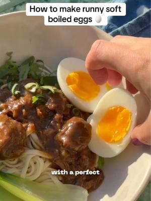 How to make the perfect runny ramen eggs or soft boiled eggs 🥚🫶🏼 Follow these steps to ensure an egg with a jammy center 🔥 Follow for more tips! #MiLa #noodles #rameneggs #ramenegg #softboiledegg #softboiledeggs #runnyeggs #eggs #howtocook #noodletok #braisedbeefnoodles #braisedbeef 