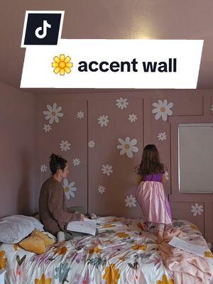 Easy peasy $15 accent wall for little girl's bedroom!  #flowerwall #flowerpower #walldecals  #vinylwalldecals #wallstickers #amazonfinds 