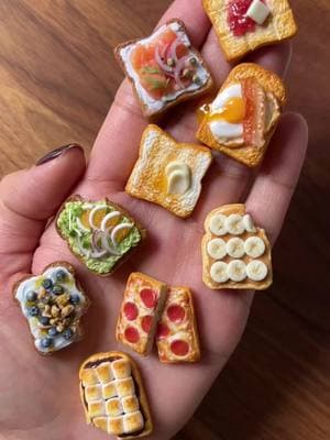 just wanted to show case some of the details of the toast magnets! 🥹🍞✨ FULL sets and INDIVUAL magnets are available in my shop! link is in bio 🍞 #art #artist #polymerclay #cute #clay #clayart #craft #handmade #explore #bread #bakery #homedecor #kitchen #miniature 