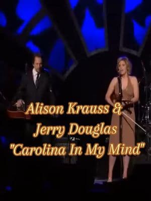 Alison Krauss and Jerry Douglas paid tribute to the great James Taylor with a beautiful cover of his timeless song, "Carolina In My Mind" at the 2006 A Musicares Person of the Year Tribute Honoring James Taylor. #alisonkrauss #jerrydouglas #jamestaylor #carolinainmymind #2006 #musiccares #dobro #fiddle #unionstation #jamestaylorcover #tribute #live #personoftheyear #carolina 