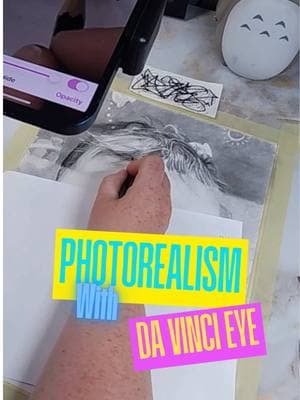 Using Da Vinci Eye to draw allows you to see more than just lines. In addition to tracing outlines, it trains your eye to see shadows and color values which helps you create photorealistic drawings like this 🤯 Instead of light, the app uses augmented reality to *virtually* project your reference photo to your paper so you can easily trace it. This also means you don’t have to draw in the dark and you can draw on any surface, not just paper. ✍️ #davincieyeapp #drawingapp #tracingapp #drawingtools #iosapp #android #photorealism #hyperrealisticart