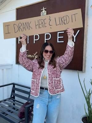 THE SPOT:  The cutest tasting room built in the early 1900s. This modern farmhouse meets mid century is a vibe!  THE WINE:  Favorites were the 2021 NAPA CABERNET SAUVIGNON, juicy, smooth and oh so, sumptuous. Also loved the 2021 NAPA VALLEY PETITE SIRAH. Black licorice and cassis, this inky dark wine is a pick me girl in all the best ways. With a lingering finish, she’s lush, bold & beautiful.  THE ACCOLADES:  2023 GRENACHE~ 2025 SF Chronicle Wine Competition Sweepstakes Winner/Best Red Wine!!  I didn’t get the chance to taste this Grenache but all the more reason for a return visit to Rippey! Not to mention the staff are seriously the nicest bunch and spent so much time sharing the history with me.  THE ROOTS: The Rippey family are fourth generation Napa natives. Nathan and Tyson first stomped Petite Sirah grapes in their grandfather’s St. Helena garage as children, which was a formative experience for them both. When dad, Dennis, transitioned into the wine business, it wasn’t long before he enlisted his sons to help in the endeavor. After over twenty-five years of experience making wines for customers both big and small, they decided it was time to launch their own wine brand, Rippey Family Vineyards.  THE PERKS:  They have the cutest room downstairs where guests can enjoy private tastings, wine pairing dinners, celebrations, live music and more! They also have a beautiful outdoor patio space with bocce ball courts.  Visit @rippeyfamilyvineyards Tasting Room at 3750 Woodbridge Road East, Acampo, CA. #winetastingoutfit #wine #cheers #winegirl #winery #sip #girly 