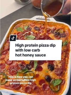 High Protein Pizza Dip + Hot Honey Sauce  Let’s make an incredible appetizer or game day dip that’s high in protein and ridiculously good. 🍕🔥 With almost 20g protein per serving, this one is perfect as a dip, an appetizer, or honestly even a meal if you’re feeling it. I used @Good Culture cottage cheese here—the undisputed MVP of cottage cheese options and my go-to for adding a ton of protein to any meal. One serving of it has just 80 calories and 14g protein, it’s a game-changer. Here’s how to make it: 1️⃣ Process 1 tub @good_culture cottage cheese (16oz), 2 garlic cloves, 1 tsp onion powder, 1 tsp Aleppo chili flakes, 1 tsp Italian seasoning in a small food processor or blender. 2️⃣ Grab an oven-safe dish. Add half of the cottage cheese mixture at the base and spread evenly. Add 1/2 cup marinara sauce as the next layer, then top with 1 cup shredded mozzarella or Colby jack cheese. Spread the remaining cottage cheese mixture, then add another 1/2 cup of marinara sauce. Finish with another cup of shredded cheese. 3️⃣ Top with thinly sliced peppers, olives, or any other pizza toppings you like. Of course I add lots of pepperoni, but you can use any protein you prefer. 4️⃣ Bake at 400°F for 20-25 minutes till nice and bubbly then top with fresh basil and hot honey. To make a homemade version, I just mixed 1/4 cup honey and 2 tbsp sriracha on low heat and poured it over the dish. 5️⃣ Serve hot with your favorite vessel—chips, crackers, or veggies. If you try it, let me know on SHREDHAPPENS! . . . . #goodculturepartner #lowcarb #lowcarbrecipes #keto #ketorecipes #diprecipes #healthyrecipes #goodmoodfood #whatsonmyplate