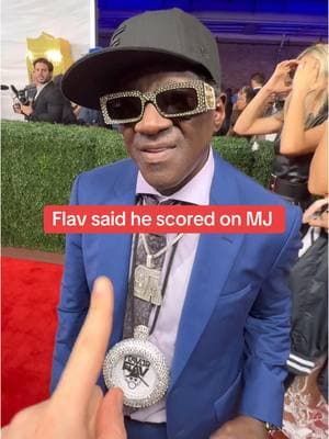 Do you think Flavor Flav actually scored a bucket on Michael Jordan? 🤔👀 #flavorflav #michaeljordan #SuperBowl #mj #thegoat #goat #redcarpet #fyp #foryou #yourpage #foryourpage 