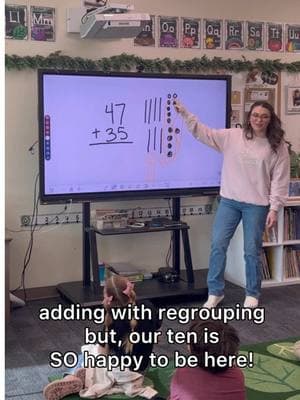 adding with regrouping, except we are *happy* about it! Here's my happy little strategy for addition with regrouping! #teacher #teaching #firstgrade #firstgrademath #teachingmath #addingwithregrouping 