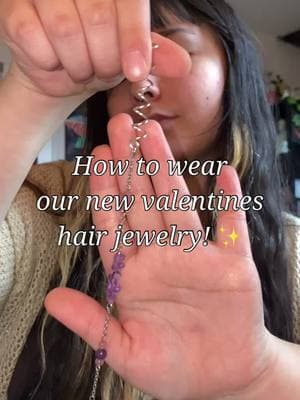 Our valentines hair jewelry is made with genuine strawberry Quartz/amethyst, stainless steel chain/wire/jump rings, genuine mother of Pearl heart bead, and so much love! ❤️  Customize your own by choosing from multiple lengths and between 2 different hair pieces!✨ Shop link in bio! 🫶🌿🍄 #hippieshop #handmadejewelry #handmadebusiness #hippiejewelry #handmadeaccessories #crystaljewelry #hairjewelry #hairtwists #hairaccessories #crystalhairjewelry #valentinesjewelry #valentinesdayjewelry #valentinesaccessories 