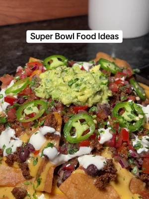 Who’s hosting tomorrow for the Super Bowl? And what y’all making?? At least one of these gotta make it to the spread! 🤤🏈  RECIPES SHOWN: Loaded supreme nachos Honey lemon pepper wings Supreme French Bread Pizza  Garlic Parmesan wings Crispy fried shrimp  Philly cheesesteak sliders  Garlic Parmesan wings  Crispy chicken sandwiches Chicken Cheesesteak eggrolls  Crab and spinach dip  Jerk chicken tacos  Chimichurri wings Cheesesteak dip  Buffalo chicken wontons  General tso wings  Shrimp and crawfish po’boy Hot Lemon Pepper Tenders  Soft pretzel bites  Chicken Parm sandwhiches Beef Barbacoa tacos  Shrimp spring rolls #superbowlfood #superbowlsnacks #gamedayfood #gamedayappetizers #theremixkitchen 