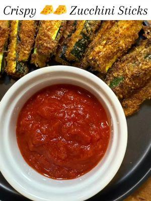 Crispy Zucchini Parmesan Sticks 🥒🧀 Like mozzarella sticks, but healthier! These crispy zucchini bites are actually addicting. How to Make It Ingredients: * 2 medium zucchinis, cut into rounds or sticks * ½ cup almond flour (or crushed pork rinds for extra crispiness) * ½ cup grated Parmesan cheese * 1 teaspoon garlic powder * 1 teaspoon Italian seasoning * 2 eggs, beaten * Dipping Sauce: Sugar-free marinara (I like Rao’s) or ranch Instructions: 1️⃣ Preheat oven to 400°F (or air fryer to 375°F). 2️⃣ Mix almond flour (or pork rinds), Parmesan, garlic powder, and Italian seasoning. 3️⃣ Dip each zucchini piece in egg, then coat in the flour or pork rind mixture. 4️⃣ Arrange on a parchment-lined baking sheet (or air fryer basket). 5️⃣ Bake for 18-20 minutes (or air fry for 8-10 minutes) until crispy. 6️⃣ Serve with sugar-free marinara or ranch for dipping! 💡 Why It Works: These are crispy, cheesy, and still feel indulgent while packing in fiber and healthy fats! #gameday #gamedaysnacks #zucchini #zucchinisticks #friedzucchini #easyhealthyrecipes #easyhealthysnacks #ketosnacks 