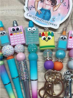 Teacher pens & lanyards! How cute are these?! 😍 #beadedpens #beadedlanyard #lanyard #pens #pen #teacher #teacherlanyard #teacherpen #cutepens #teachergifts #crayonlanyard #glue #calculator #gifts #schoollanyard #schoolpen #schoolsupplies #schoolsupplypen 