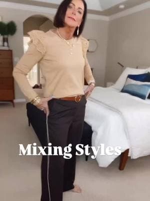 Over 60 style. The key to a well curated look.  Try mixing different style pieces together.  Here I’ve put menswear inspired pants (loose fitting) with a feminine ruffle shoulder fitted top.  Finished it off with streetwear style sneakers.  The hat is the finishing touch! Leave any comment for links🔗 #styleover60fashion  #styleover60  #over60style  #casualstyle #menswearstyle  #sneakerstyles 