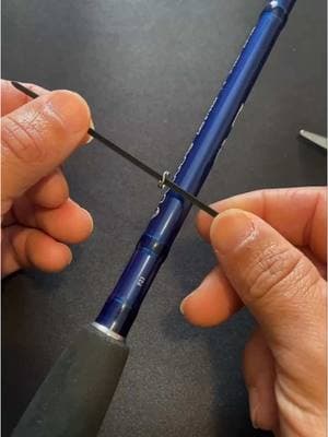 FISHING ROD HACK - DIY Hook Keeper ➡️ Here’s a simple trick if you need to add a hook keeper to a rod that doesn't have one. Just use a split ring and a zip tie, put it around the base of the rod near the handle, cinch it down, and cut off the excess. And DONE!  #fishinghacks #fishinggear #fishingtackle #inshorefishing #fishingrod #tackletuesday #tackletips #fishingtips 